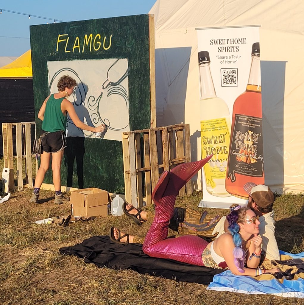 Flamgu Live Painting with Sweet Home Spirits at Imagine Music Festival Live Painting alternative branding art marketing distillery